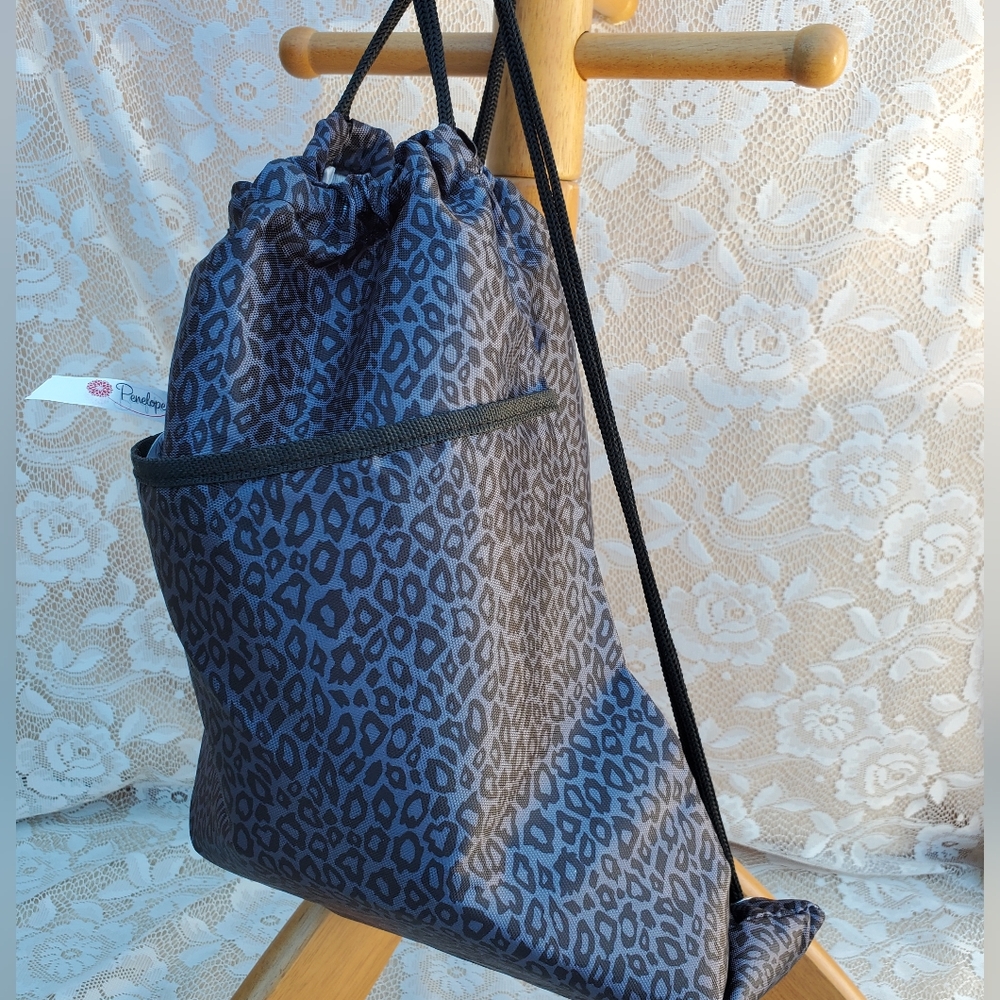 Cheetah print drawstring backpack New outside zip pocket packable Home Interiors